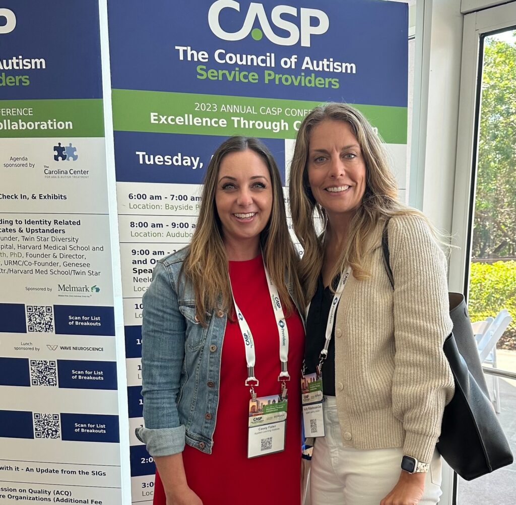 Casey Falen and Holly Rittenhouse-Cea smiling at The Council of Autism